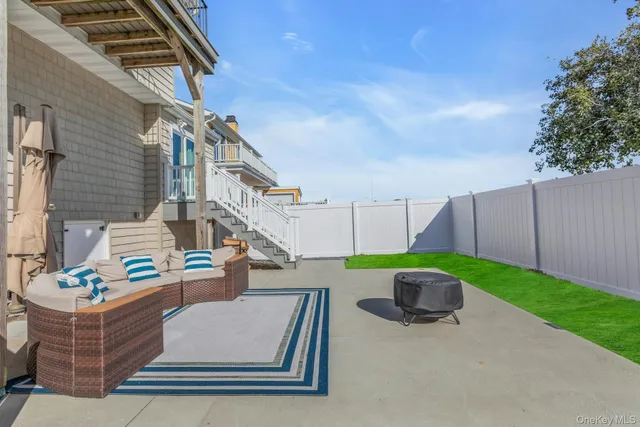 a view of a field with an ocean