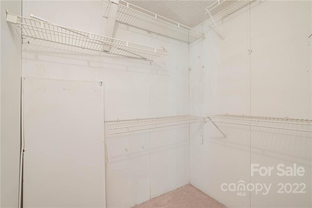 600 East Sandy Ridge Road Monroe, NC 28112 - Photo 22 of 27 a view of small space with racks on the wall