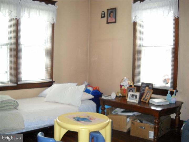 220 Easton Road Riegelsville, PA 18077 - Photo 2 of 6 a living room with furniture and a window
