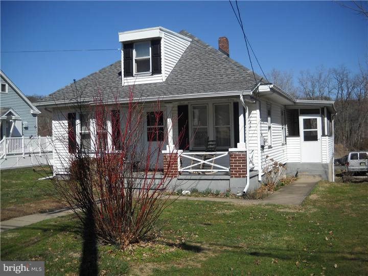 220 Easton Road Riegelsville, PA 18077 - Photo 4 of 6 a front view of a house with garden