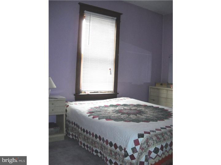 220 Easton Road Riegelsville, PA 18077 - Photo 5 of 6 a bedroom with a bed and a window