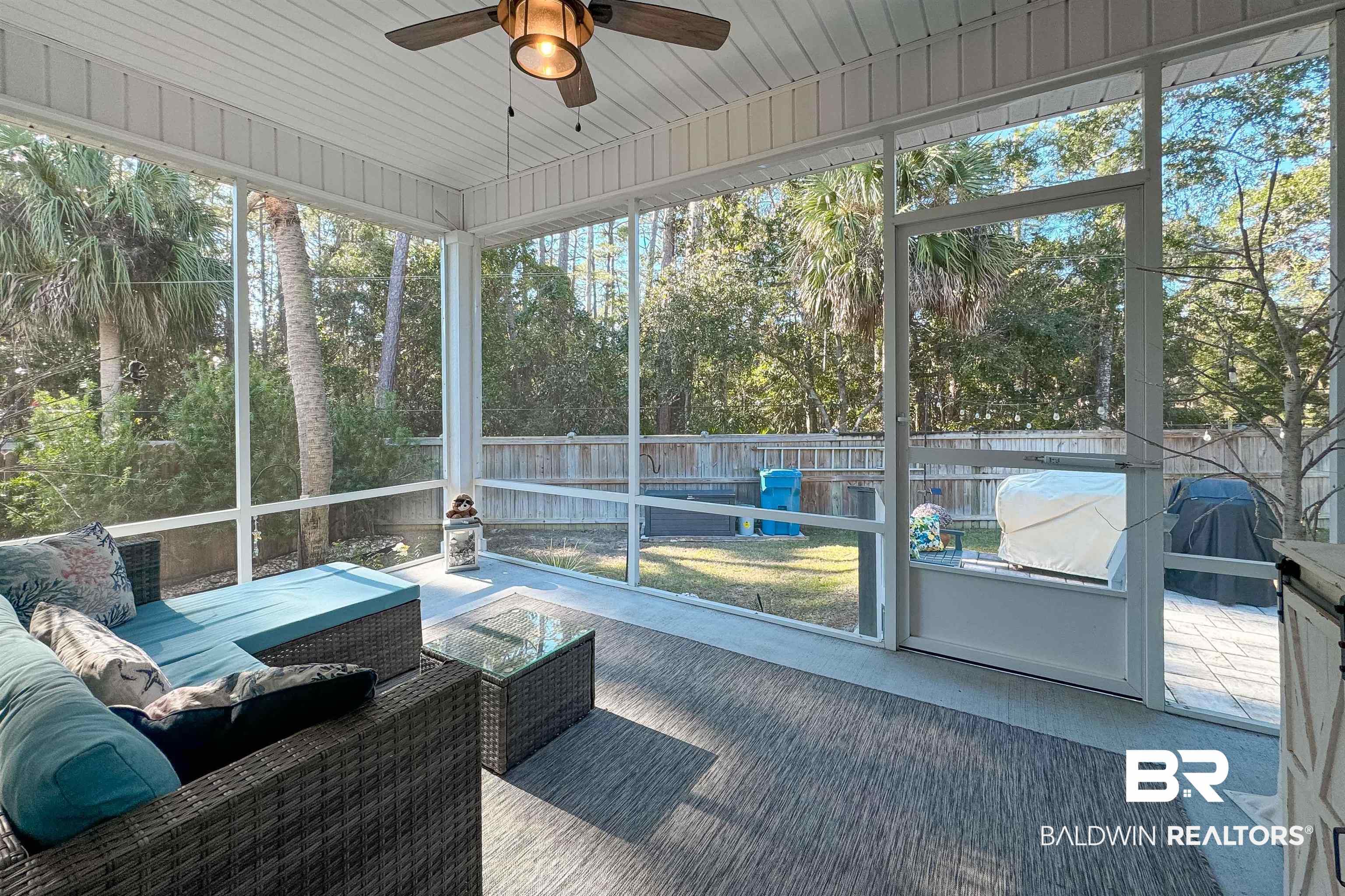 1290 Mako Loop Gulf Shores, AL 36542 - Photo 35 of 50 Sunroom / solarium featuring a ceiling fan and a healthy amount of sunlight