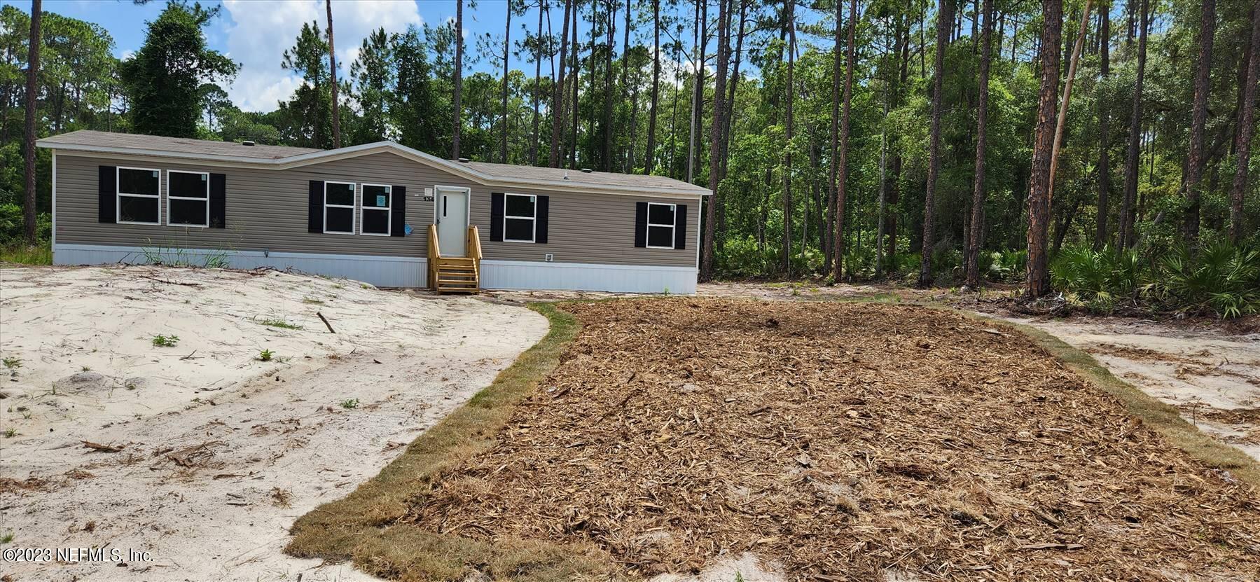 134 Juniper Road Georgetown, FL 32139 - Photo 3 of 20 a view of a house with a yard