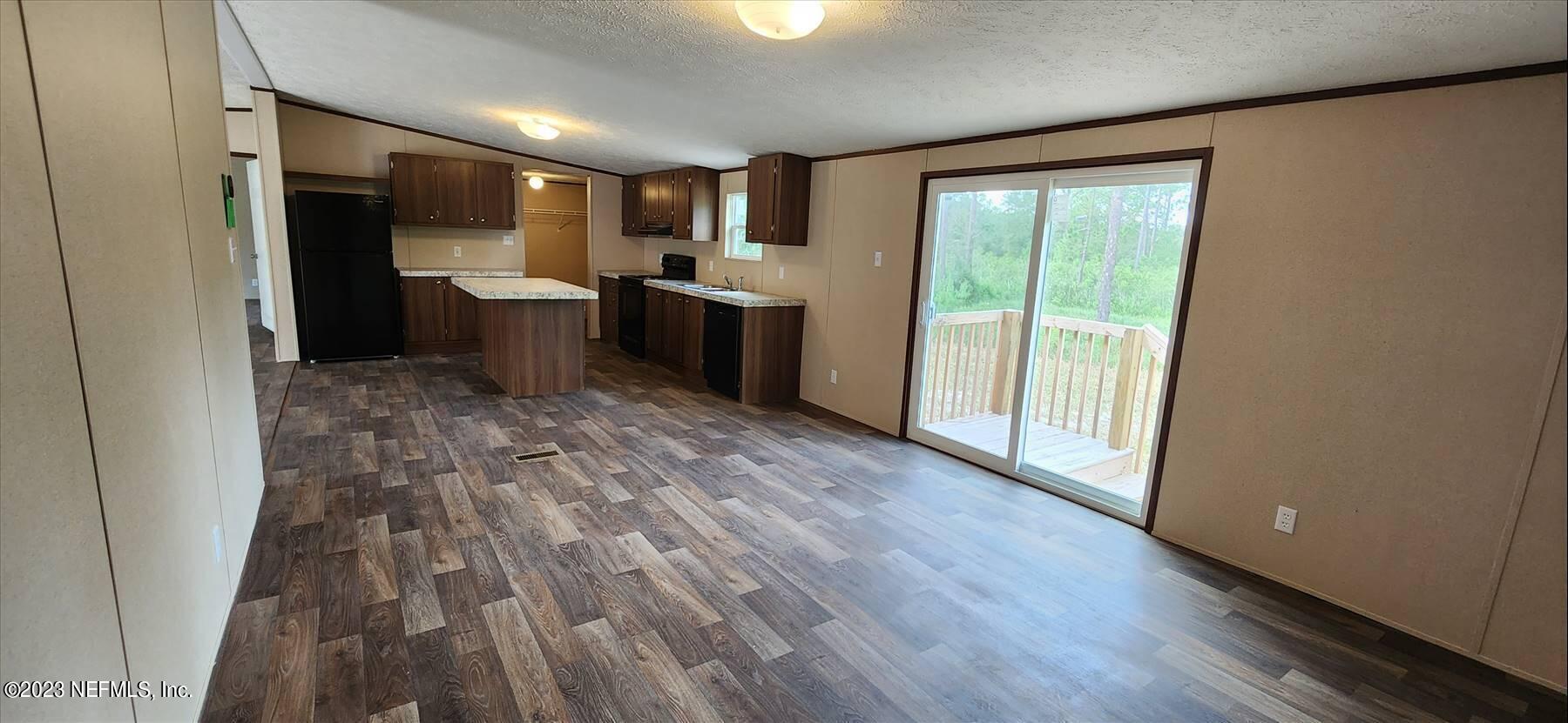 134 Juniper Road Georgetown, FL 32139 - Photo 6 of 20 a view of kitchen with wooden floor