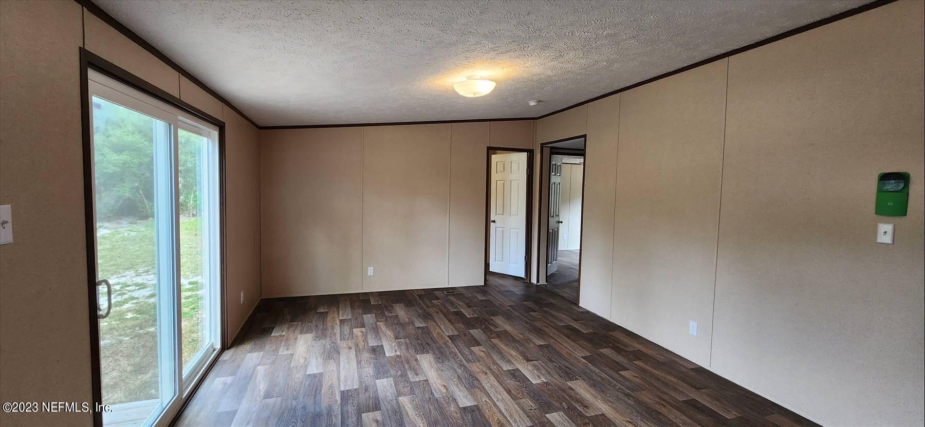 134 Juniper Road Georgetown, FL 32139 - Photo 7 of 20 a view of hallway with wooden floor
