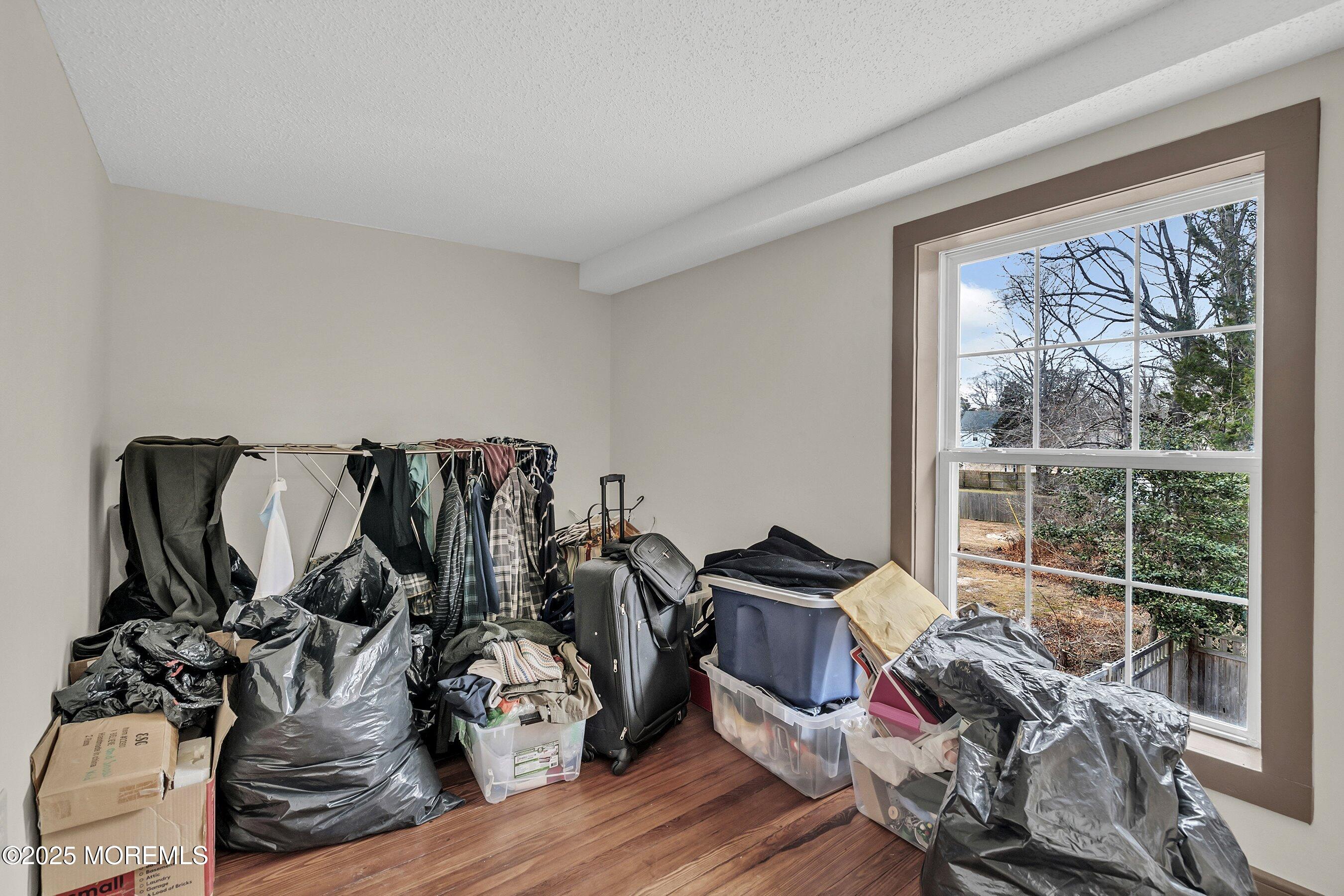 Main Street Barnegat, NJ 08005 - Photo 17 of 26 a view of a livingroom with furniture hardwood floor and a window