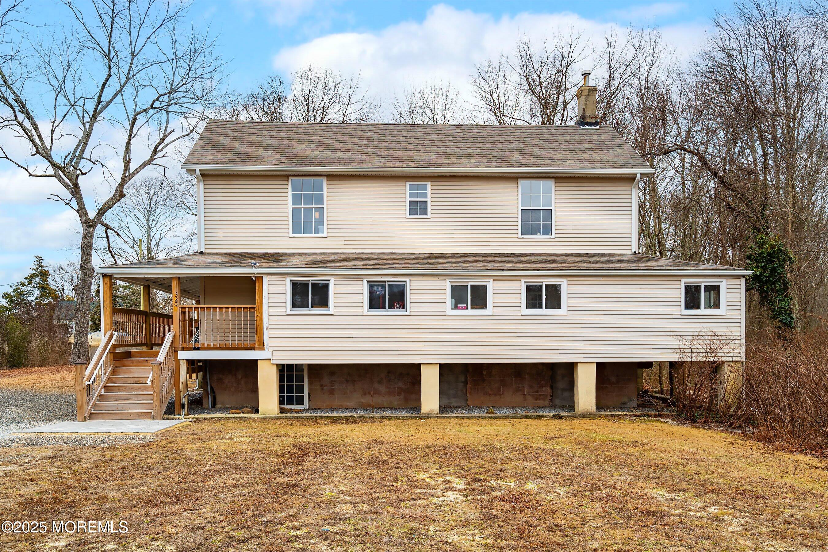 Main Street Barnegat, NJ 08005 - Photo 3 of 26 a front view of a house with a yard