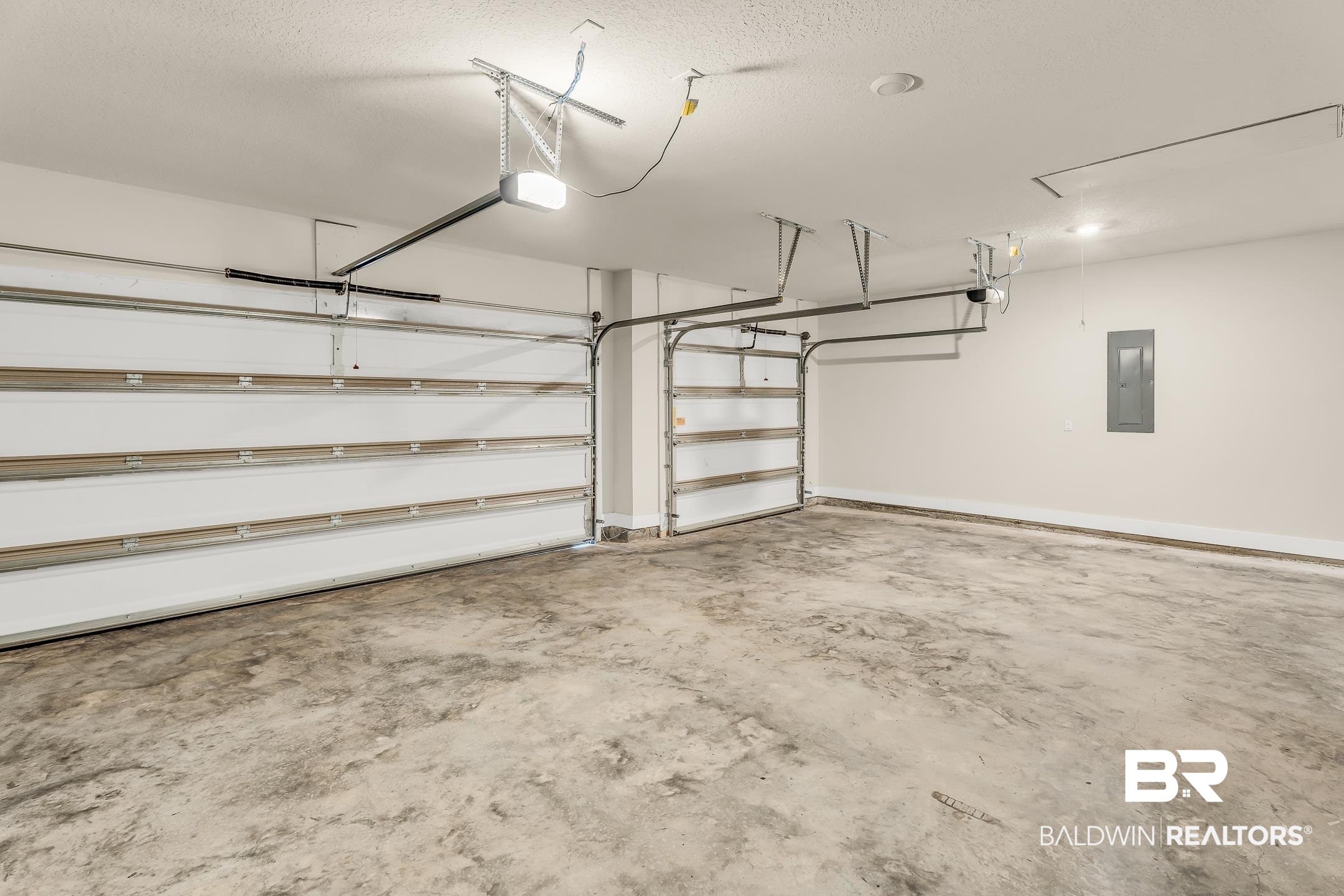 1720 Partridge Street Foley, AL 36535 - Photo 31 of 32 3 Car garage with a garage door opener and electric panel