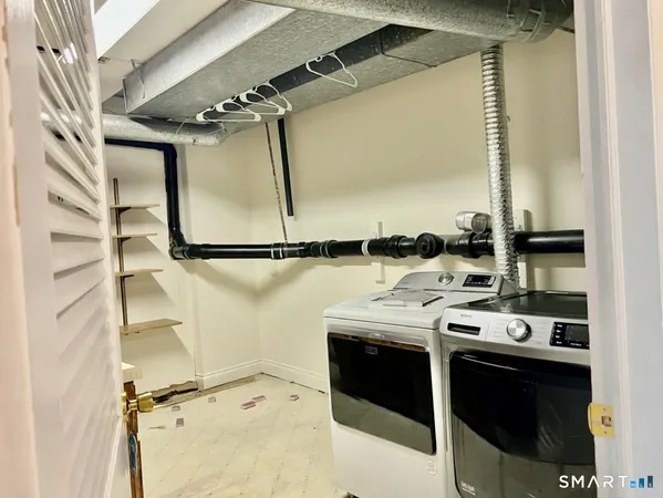 a kitchen with a stove and a refrigerator