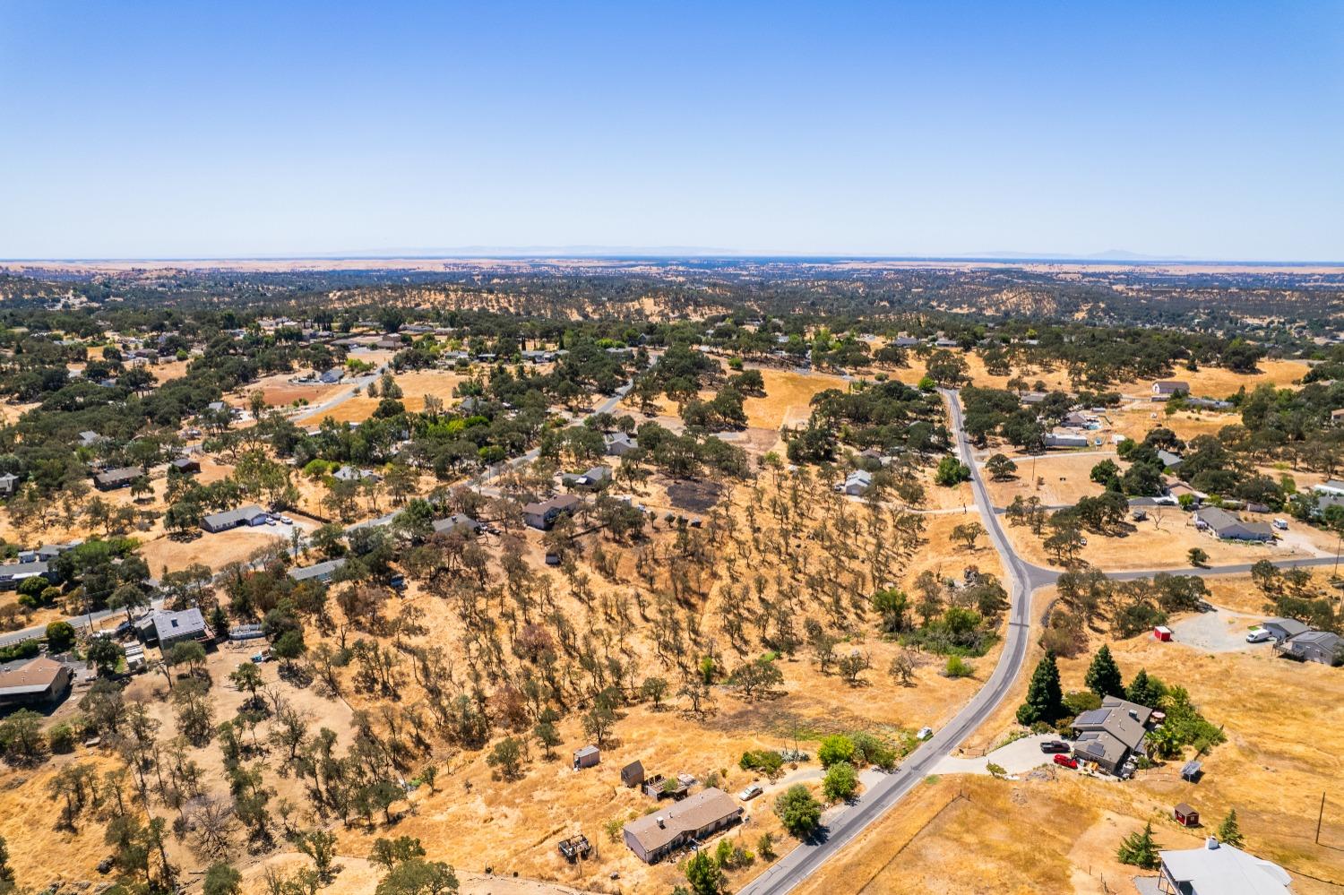 5015 Bane Road Valley Springs, CA 95252 - Photo 16 of 20 an aerial view of residential space with city view