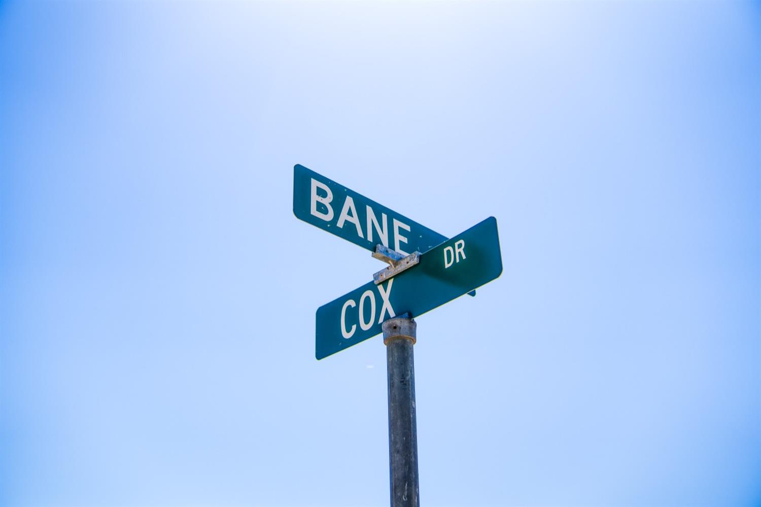 5015 Bane Road Valley Springs, CA 95252 - Photo 9 of 20 a street sign sitting on a pole