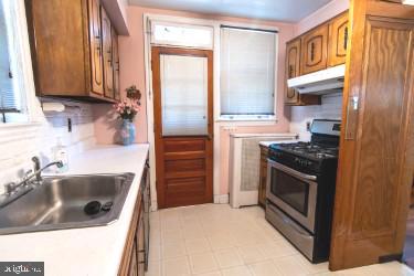 2516 32nd Street Southeast Washington, DC 20020 - Photo 11 of 40 Kitchen with exit to Terrace