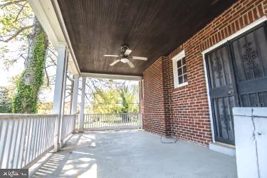 2516 32nd Street Southeast Washington, DC 20020 - Photo 10 of 40 Main level deck w fan