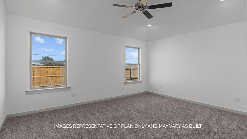 7445 9th Street Lubbock, TX 79416 - Photo 7 of 16 a view of an empty room with a window