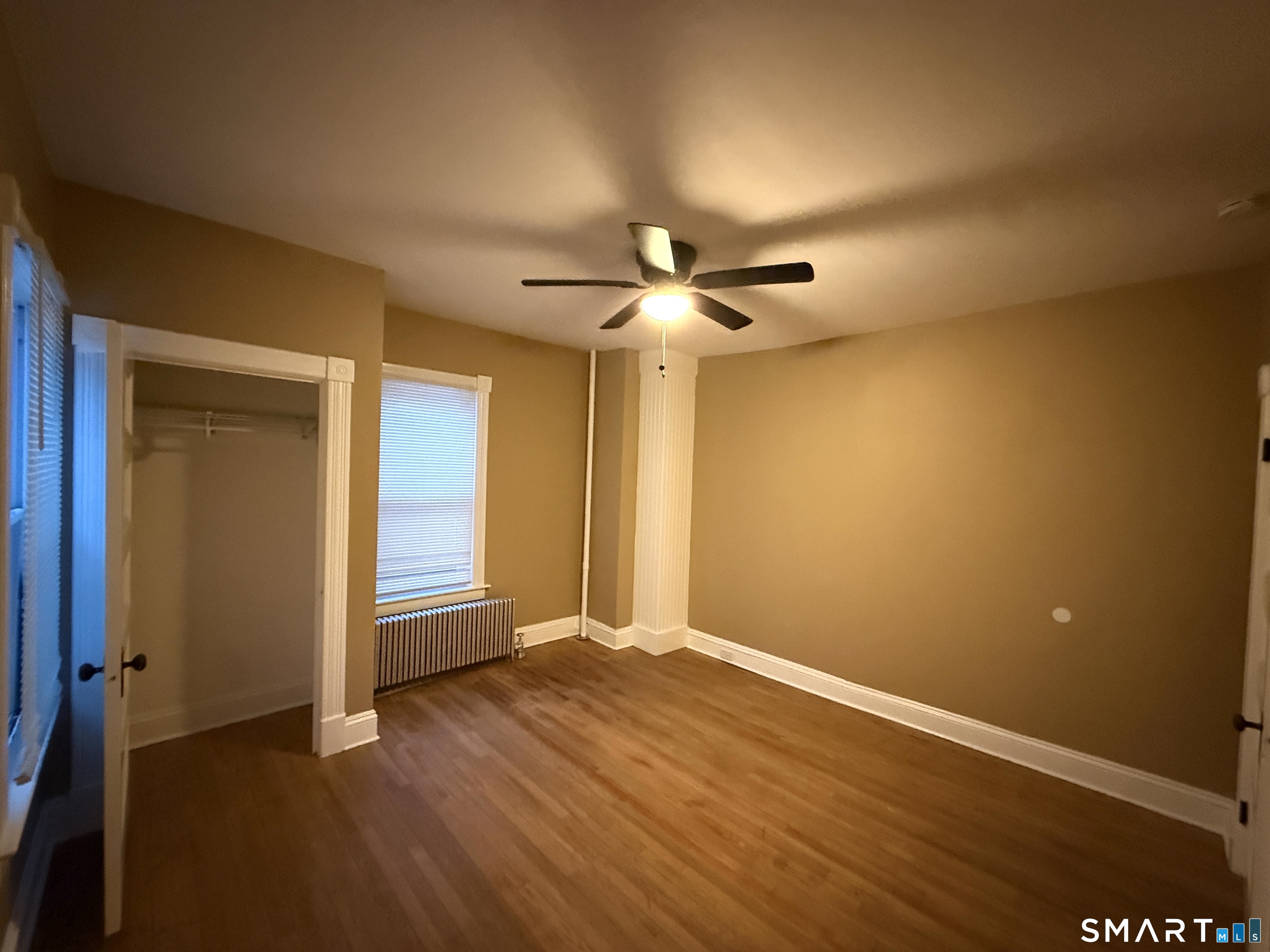 80 North Street Windham, CT 06226 - Photo 11 of 16 a view of an empty room with a window