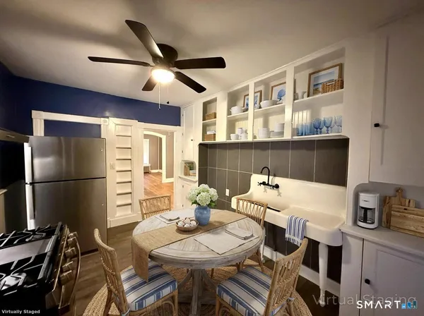 a view of a dining room with furniture