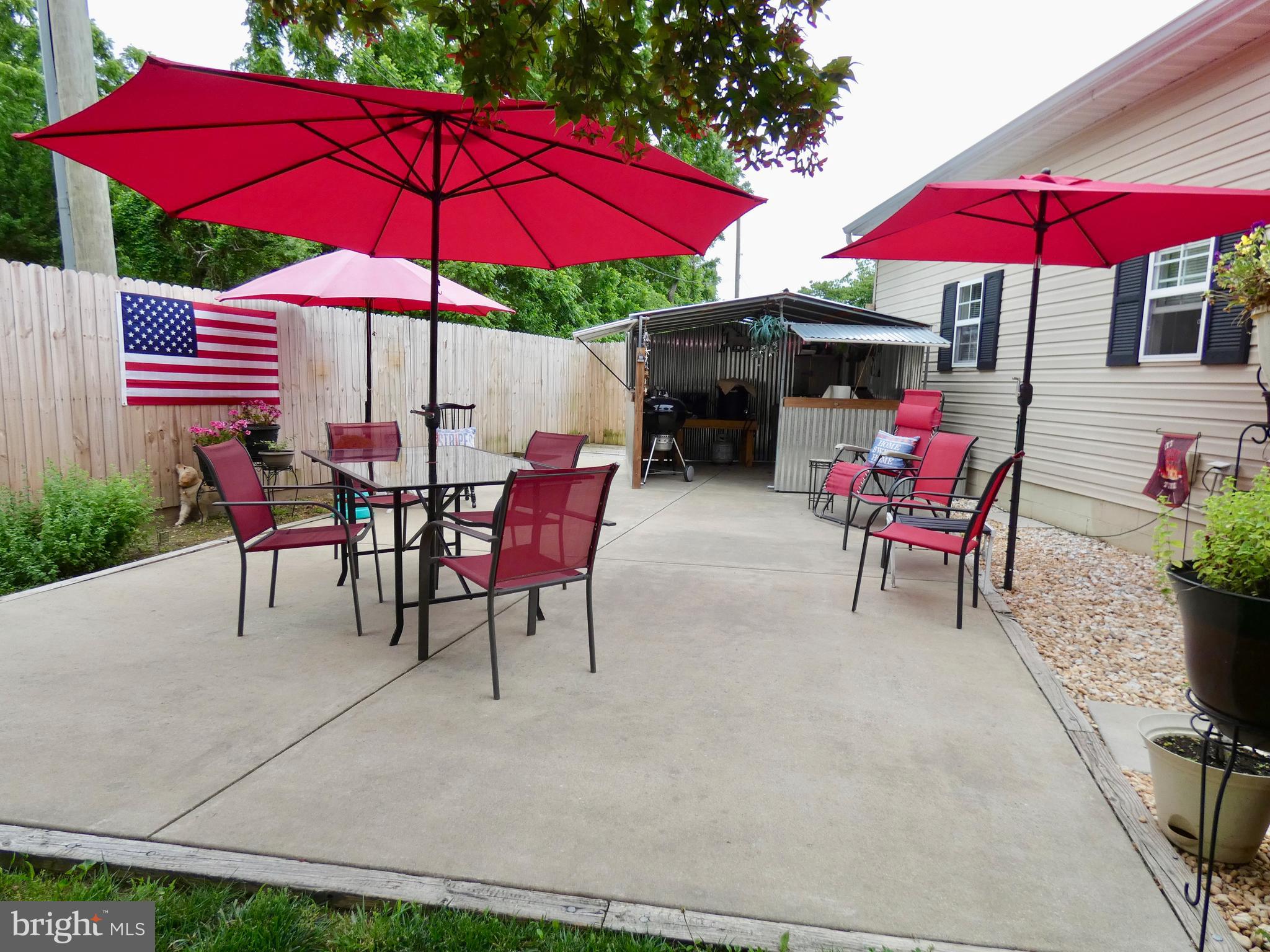 100 Carroll Road Centreville, MD 21617 - Photo 21 of 40 Rear Patio with included Grilling/Smoking Shack