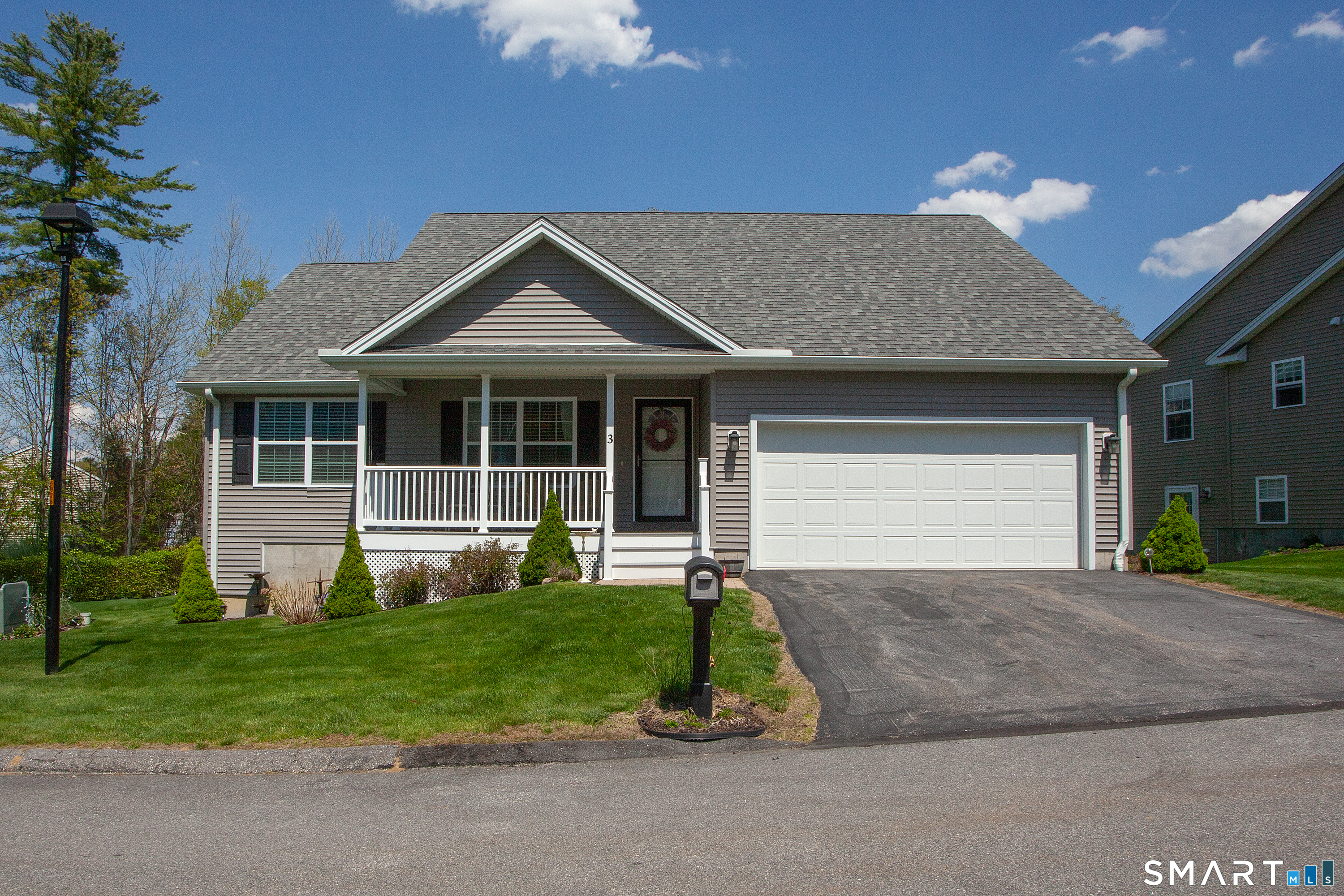 3 Hannah Way Torrington, CT 06790 - Photo 1 of 23 a front view of a house with a yard and garage