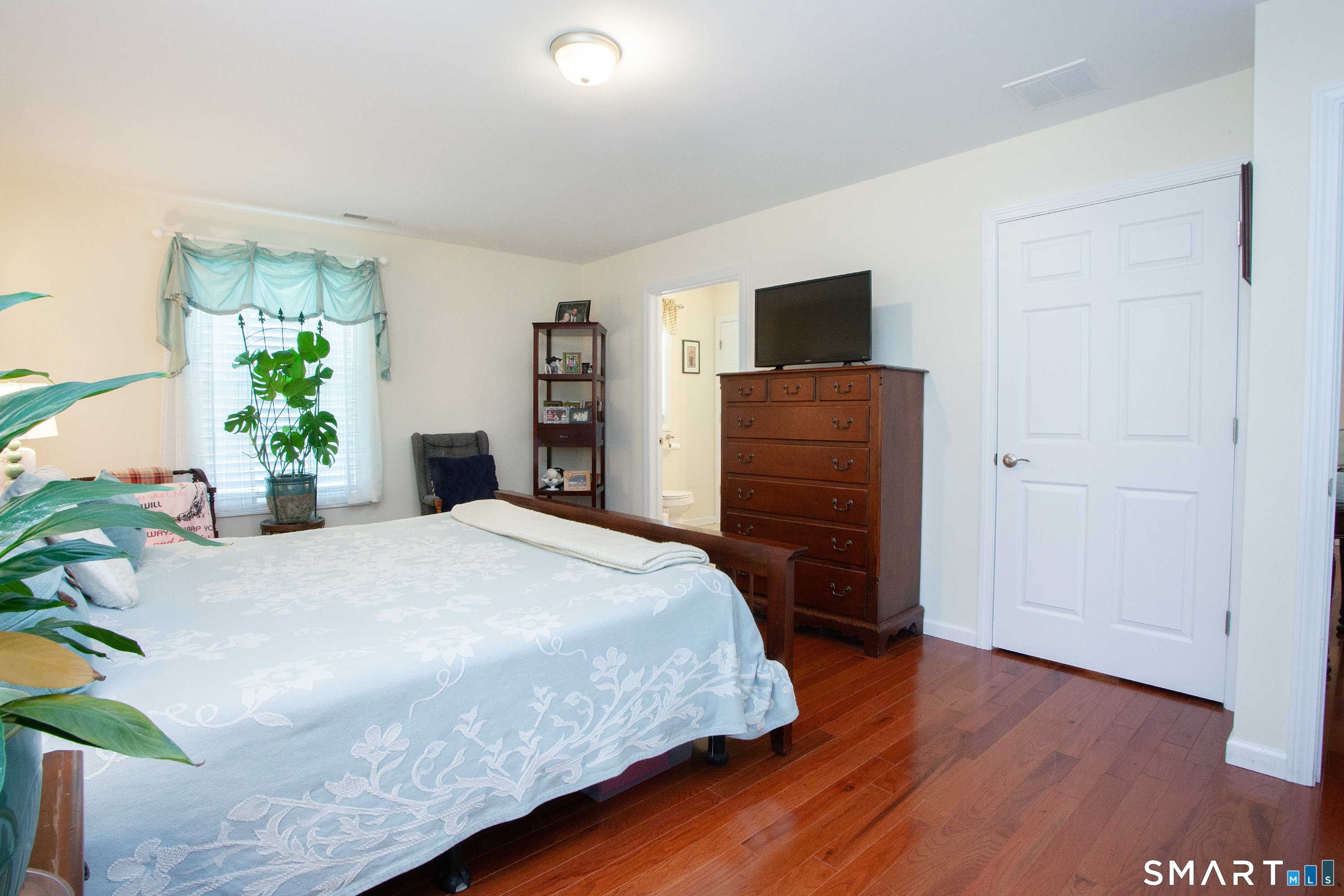 3 Hannah Way Torrington, CT 06790 - Photo 11 of 23 a bedroom with a bed and a television