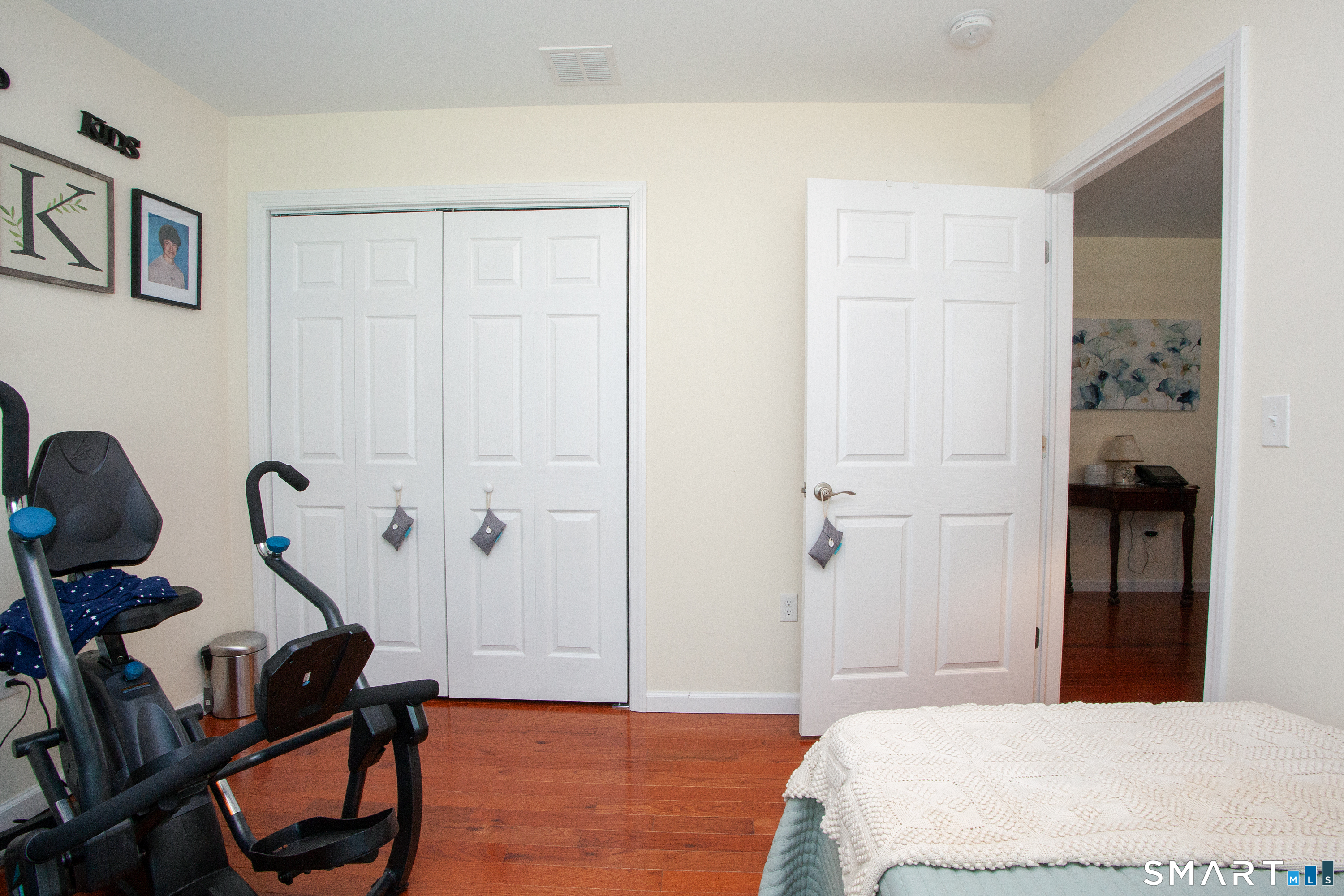 3 Hannah Way Torrington, CT 06790 - Photo 16 of 23 a bedroom with a bed and a mirror
