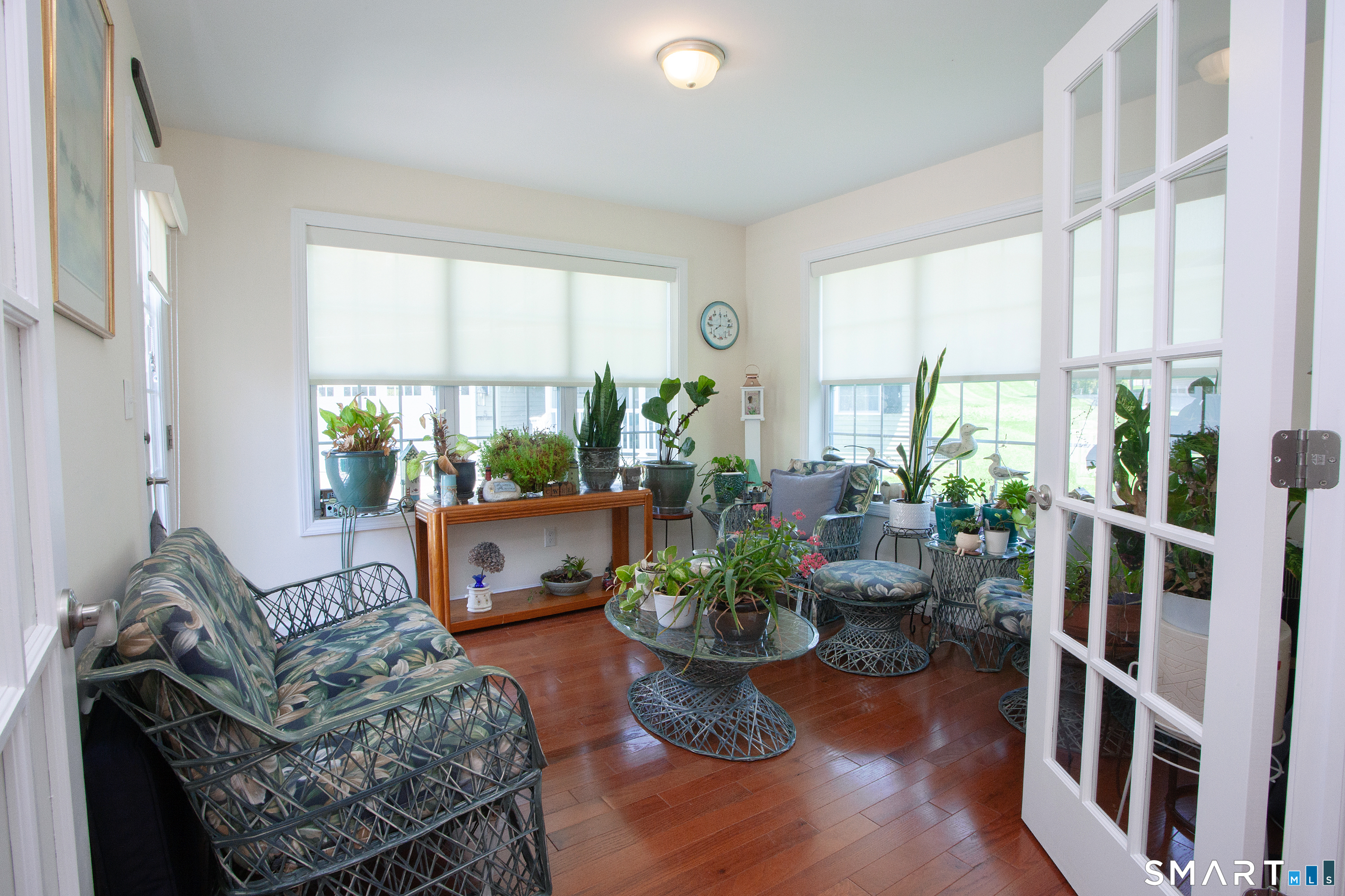 3 Hannah Way Torrington, CT 06790 - Photo 18 of 23 a living room with furniture potted plant floor to ceiling windows and a potted plant