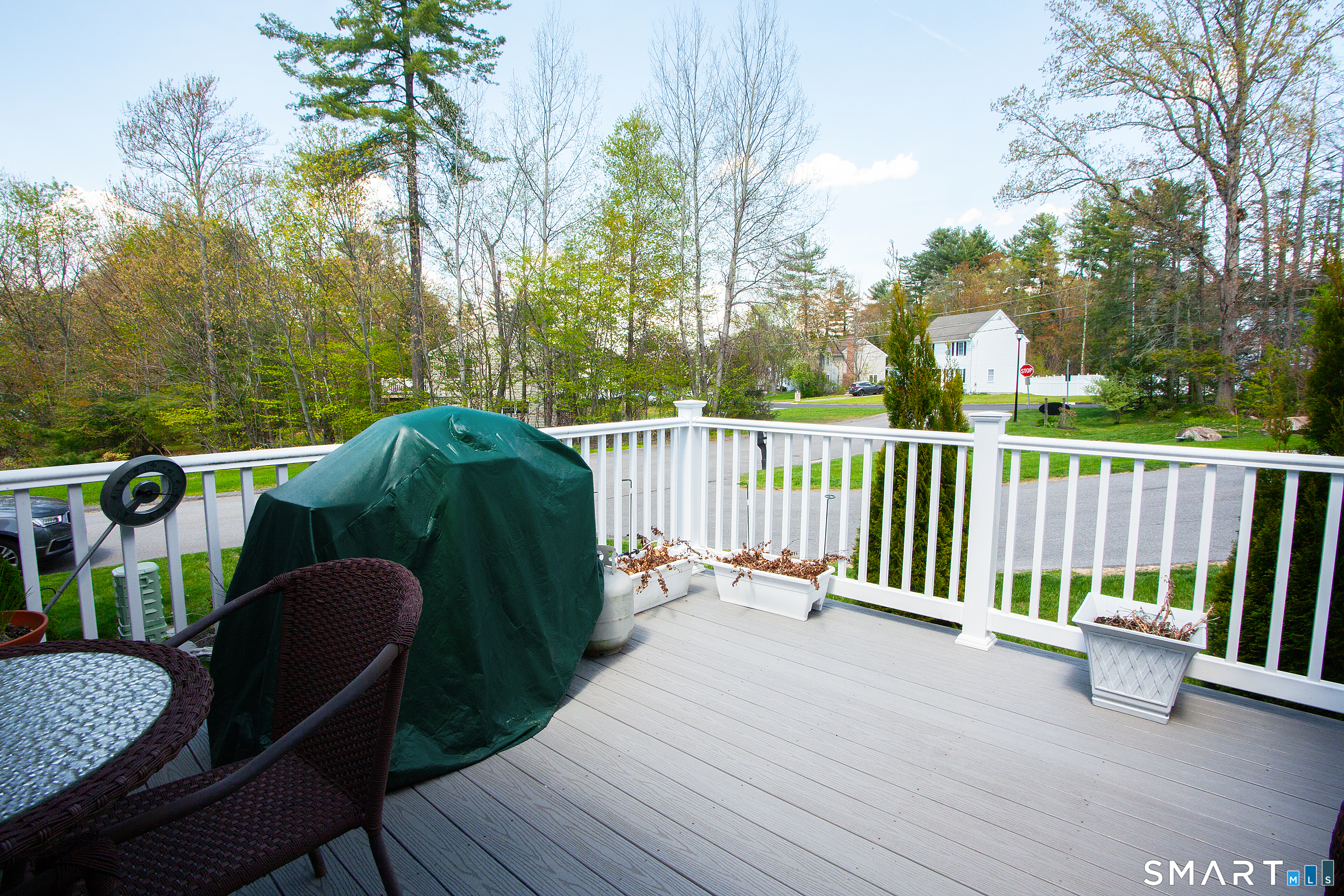 3 Hannah Way Torrington, CT 06790 - Photo 20 of 23 a view of a two chairs in the deck under a large tree