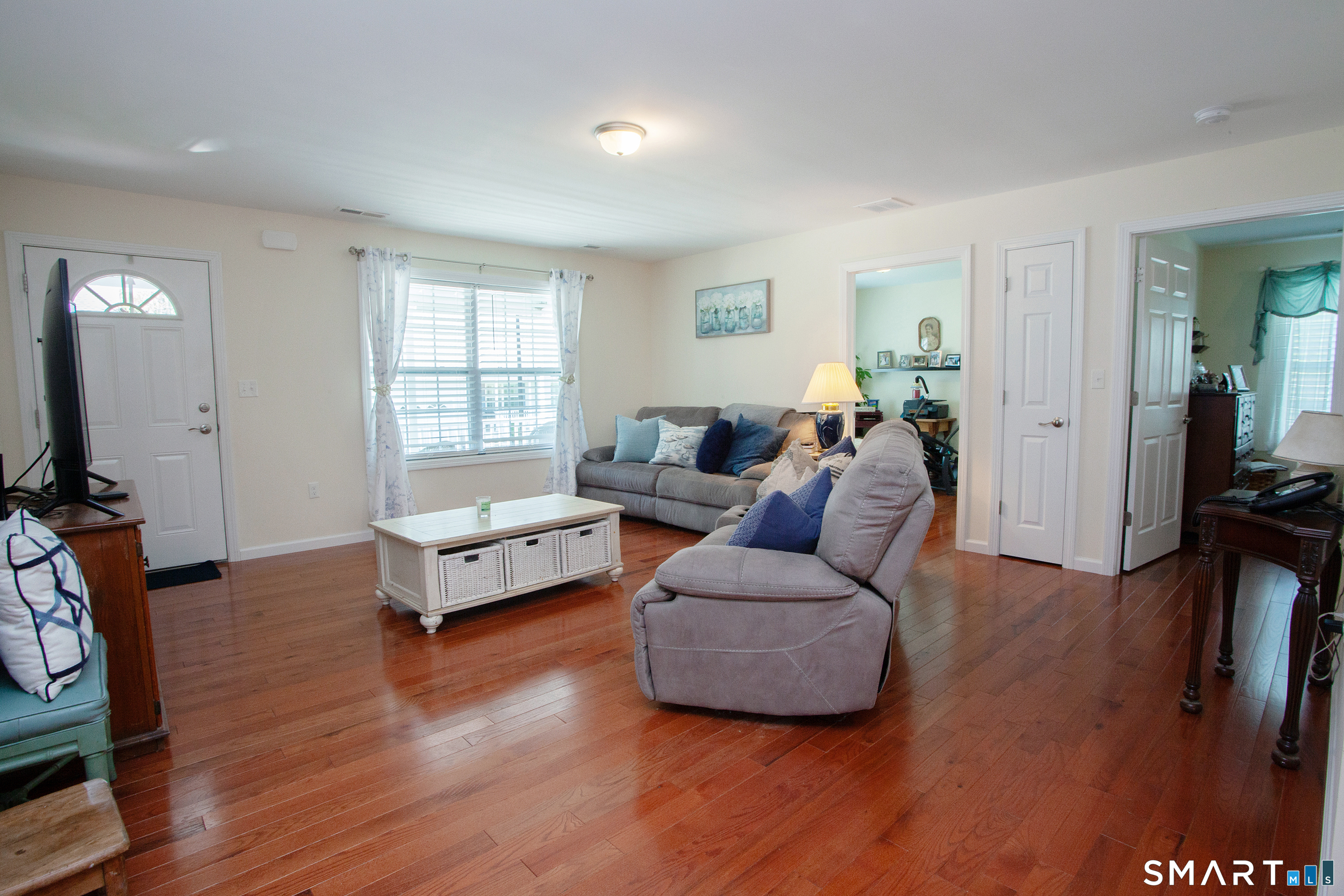 3 Hannah Way Torrington, CT 06790 - Photo 9 of 23 a living room with furniture and a wooden floor