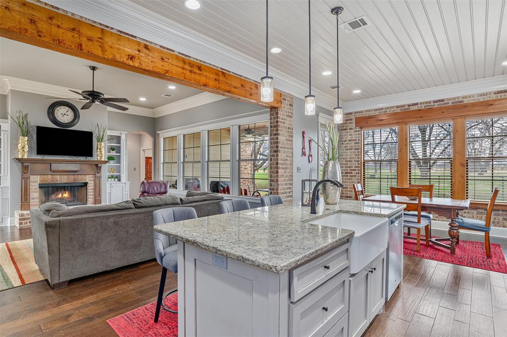 106 Pear Tree Lane Benton, LA 71006 - Photo 11 of 26 a kitchen with sink cabinets and wooden floor
