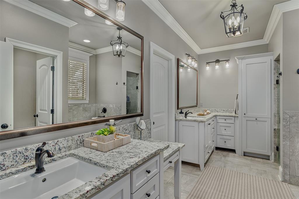 106 Pear Tree Lane Benton, LA 71006 - Photo 14 of 26 a bathroom with a granite countertop sink double vanity and a mirror