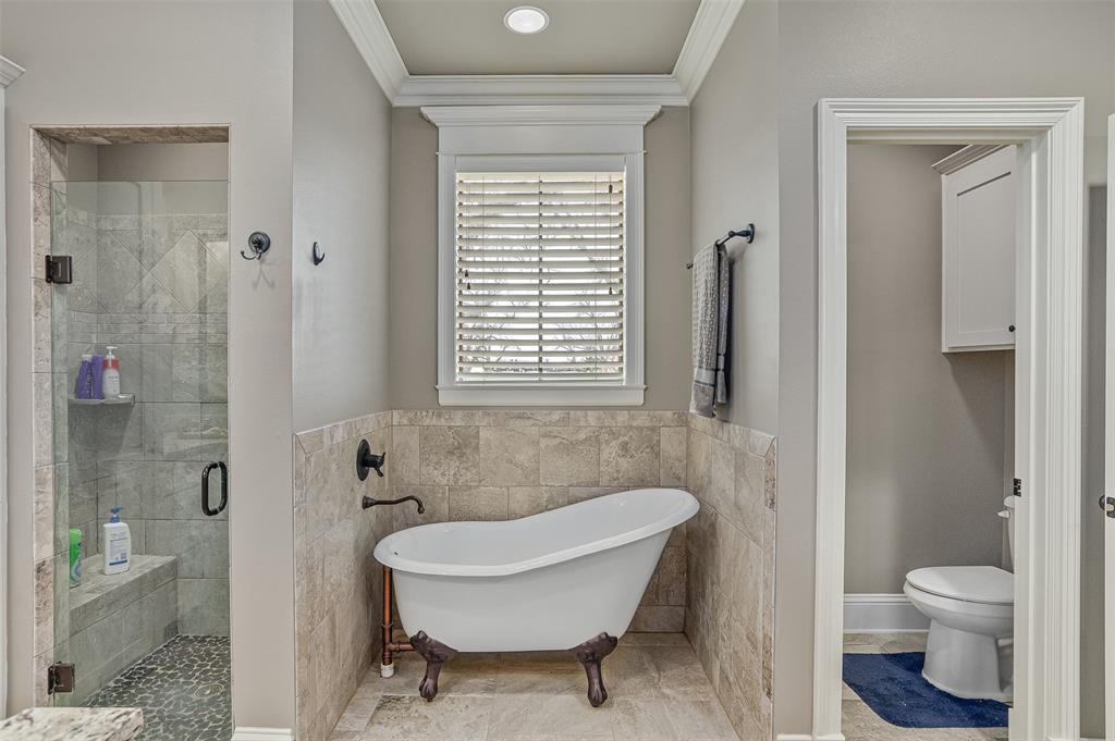 106 Pear Tree Lane Benton, LA 71006 - Photo 15 of 26 a bathroom with a toilet and a shower