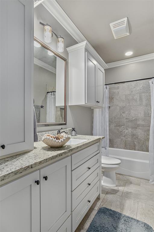 106 Pear Tree Lane Benton, LA 71006 - Photo 19 of 26 a bathroom with a granite countertop sink toilet and shower