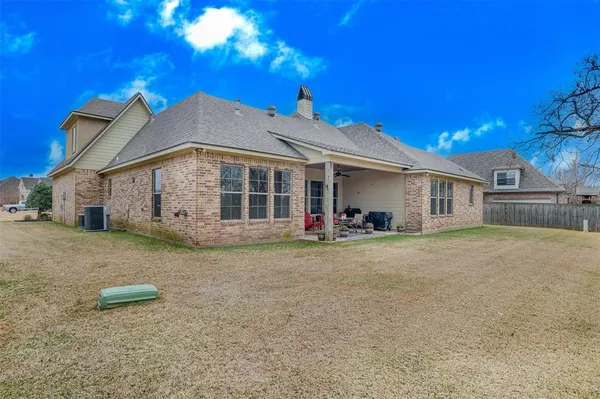 a view of a house with a patio