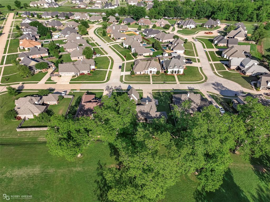 106 Pear Tree Lane Benton, LA 71006 - Photo 26 of 26 an aerial view of residential house with outdoor space and trees all around