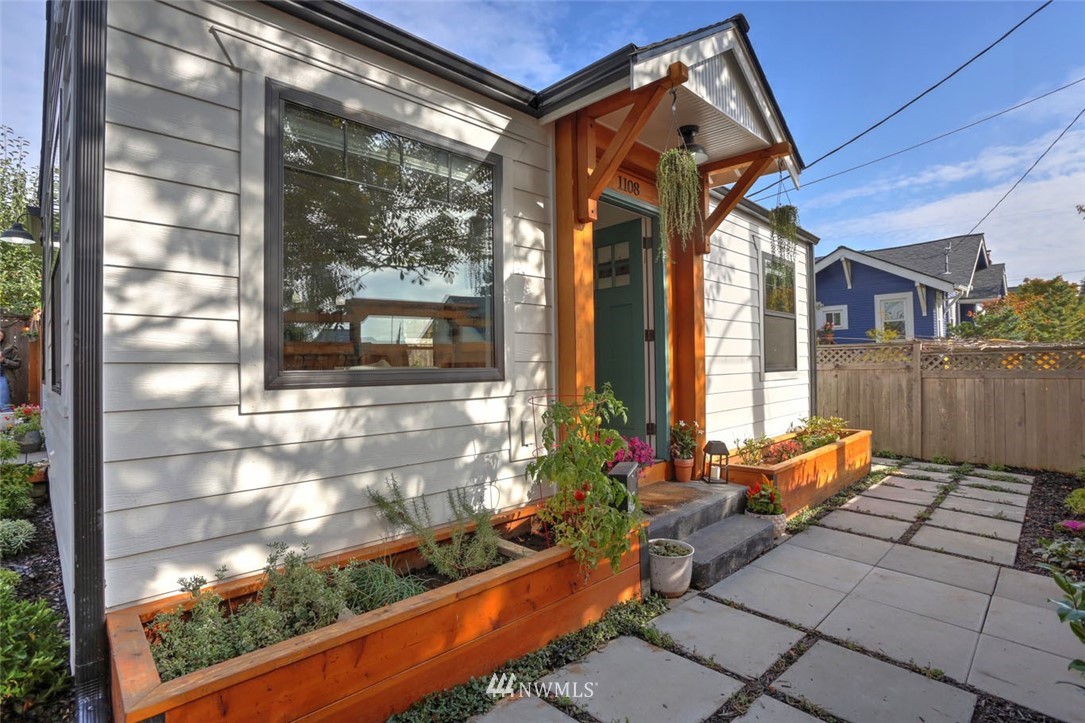 1108 North 41st Street Seattle, WA 98103 - Photo 25 of 32 a front view of a house with a porch