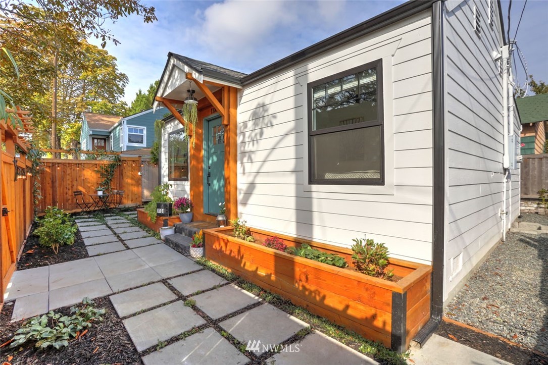 1108 North 41st Street Seattle, WA 98103 - Photo 27 of 32 a front view of a house with a yard