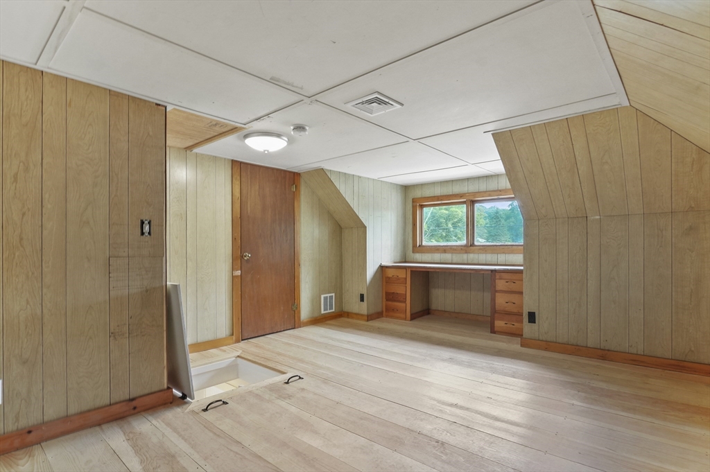 224 Elm Street Amesbury, MA 01913 - Photo 22 of 29 a view of empty room with wooden floor and fan