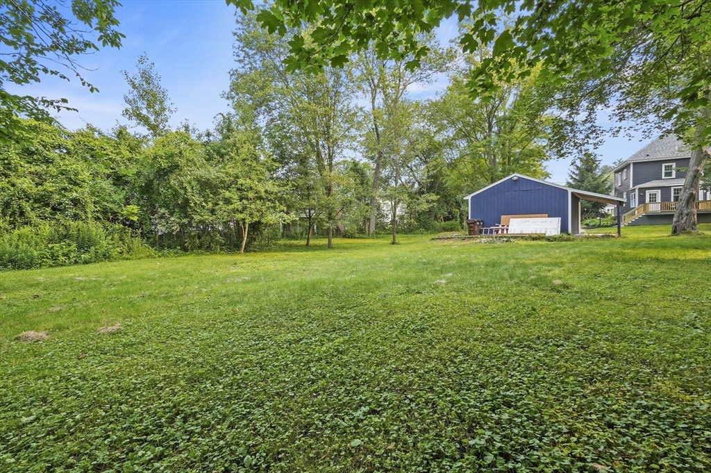 224 Elm Street Amesbury, MA 01913 - Photo 27 of 29 a view of a house with a big yard