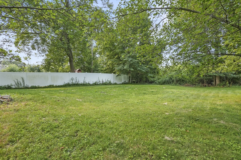 224 Elm Street Amesbury, MA 01913 - Photo 28 of 29 a view of swimming pool with a yard