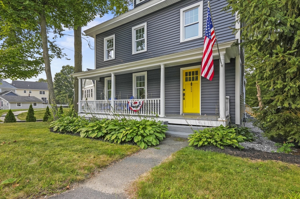 224 Elm Street Amesbury, MA 01913 - Photo 29 of 29 a front view of a house with garden