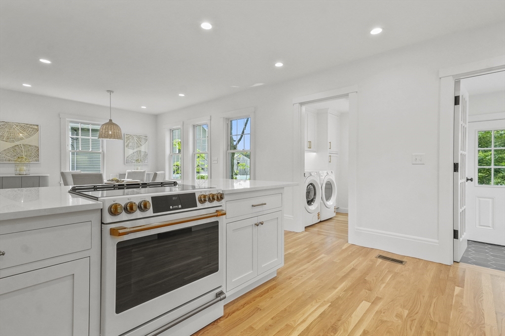 224 Elm Street Amesbury, MA 01913 - Photo 4 of 29 a kitchen with a stove oven and sink