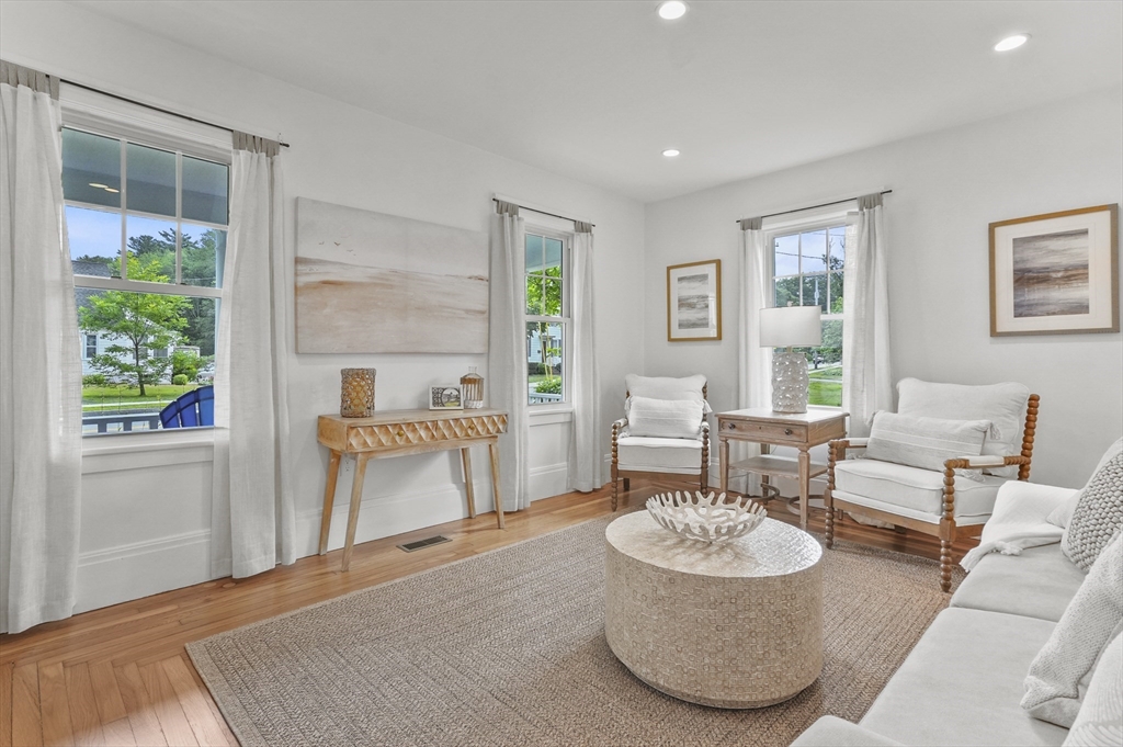 224 Elm Street Amesbury, MA 01913 - Photo 7 of 29 a living room with furniture and a large window