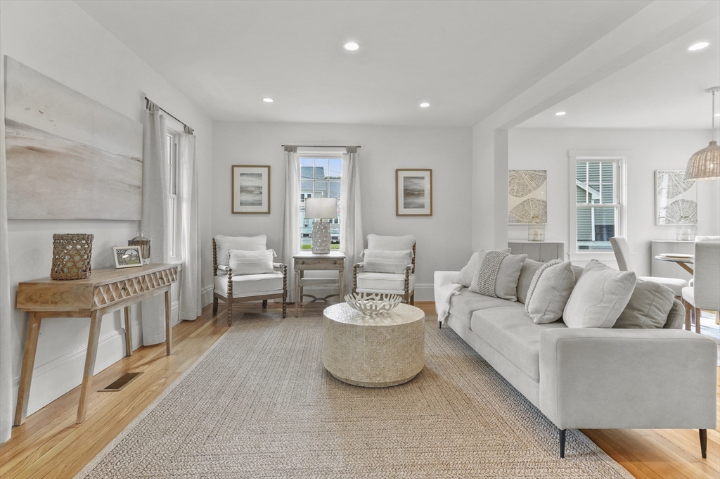 224 Elm Street Amesbury, MA 01913 - Photo 8 of 29 a living room with furniture and a large window