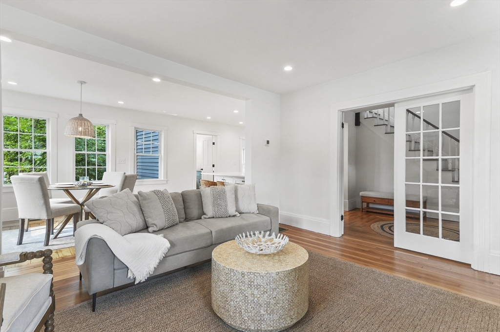 224 Elm Street Amesbury, MA 01913 - Photo 9 of 29 a living room with furniture and a large window