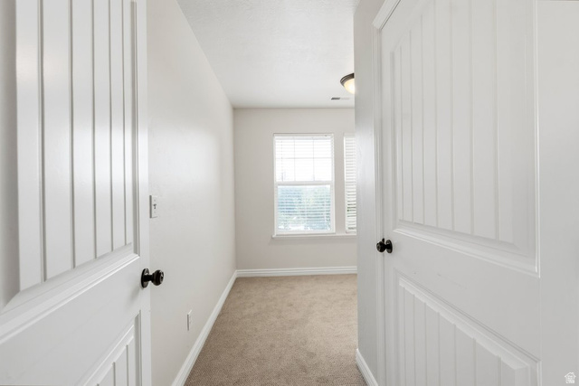 2029 West Crescent Row Mapleton, UT 84664 - Photo 18 of 35 Neutral wall color, carpeted flooring, white window blinds, and overhead lighting