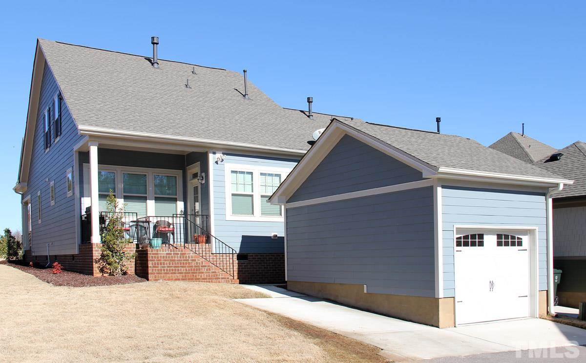 1300 Rodessa Run Raleigh, NC 27607 - Photo 2 of 16 a view of a house with a snow in front of it