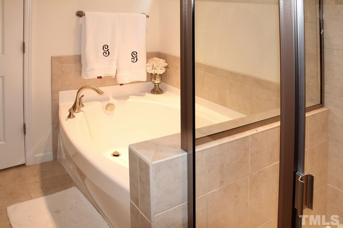 1300 Rodessa Run Raleigh, NC 27607 - Photo 12 of 16 a bathroom with a tub
