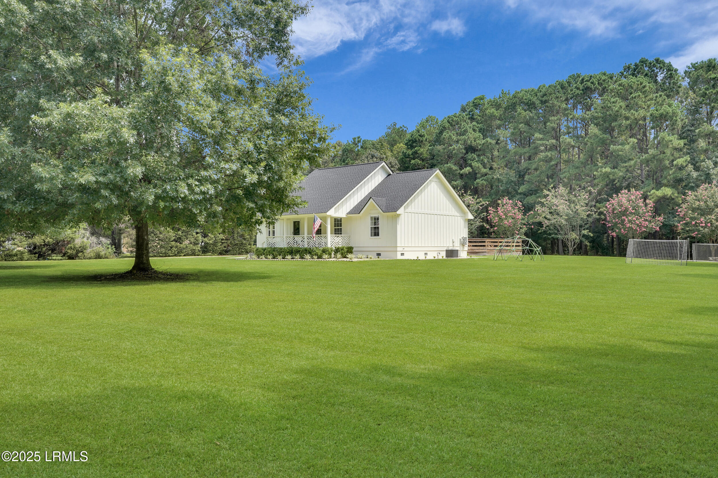 22 Butler Farm Road Seabrook, SC 29940 - Photo 54 of 71 Front Corner Yard
