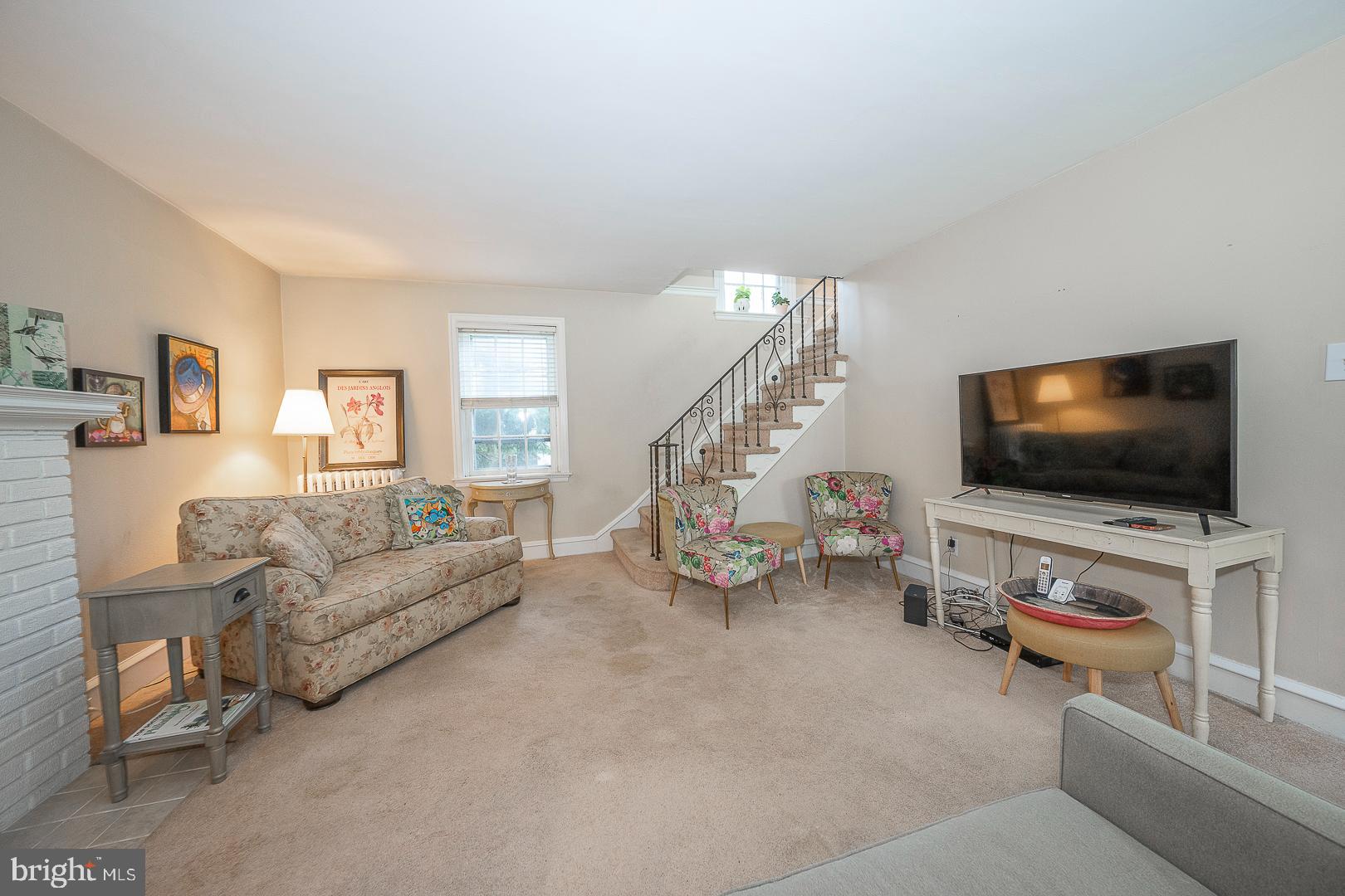 124 Crosshill Road Wynnewood, PA 19096 - Photo 5 of 22 a living room with furniture and a flat screen tv