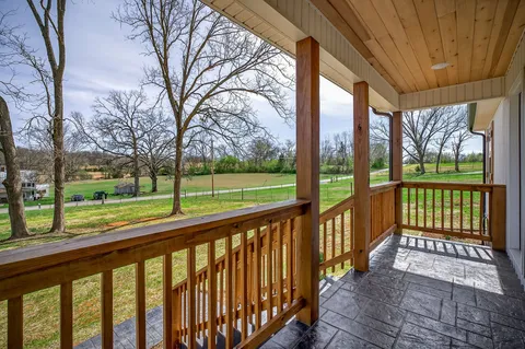 a view of a porch with a yard