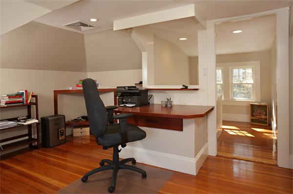 125 Moffat Road Newton, MA 02468 - Photo 8 of 9 a view of a workspace with furniture and wooden floor